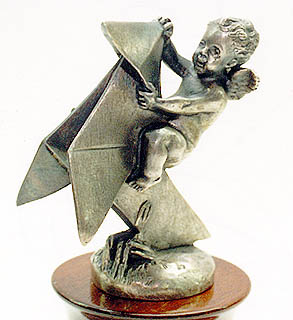 Boy riding Origami Plane